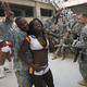 Illustration for article titled Redskins Cheerleader Arrives In Iraq, Promptly Tosses Hair